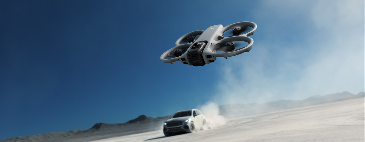 DJI Avata 360 FPV drone flying over desert terrain for RC 2, Fly More and Motion Combo buyer comparison