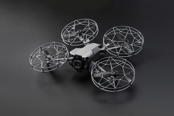 DJI Mini 5 Pro quick-release propeller guards shown installed; Mini 5 Pro versions only, aircraft not included.