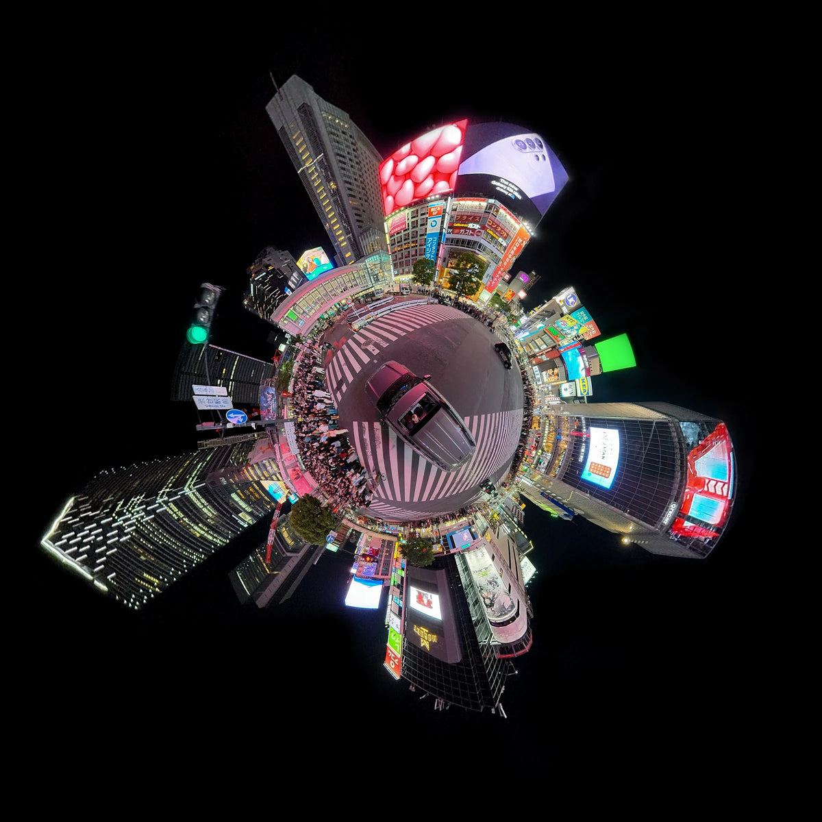 DJI Osmo 360 II sample showing an illuminated city in a tiny-planet composition at night