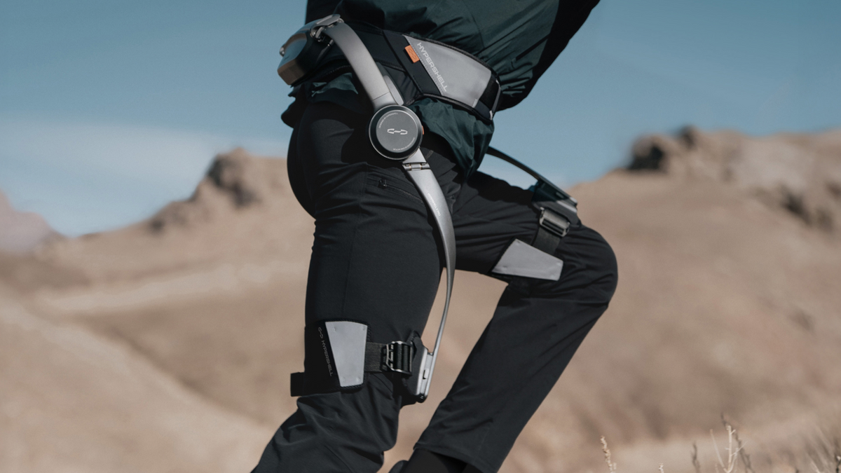 Person wearing Hypershell X Pro on a rocky outdoor route